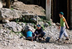 Kids playing in their own backyard in Arslanbob village
